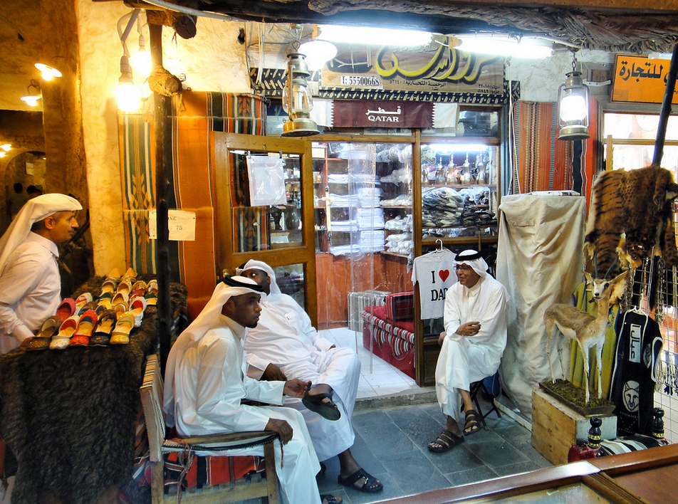 Men Relax in a Qatari Souq